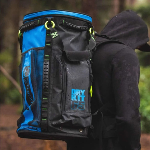 Blue Arbortec Cobra Gear Bag 65L feature - an arborist with the backpack in the field